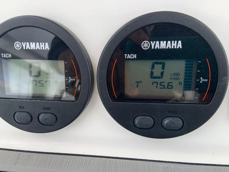 Slide: The Image of Yamaha tachometers on a 2019 Sea Fox 266 Commander boat dashboard, displaying engine hours. - 4