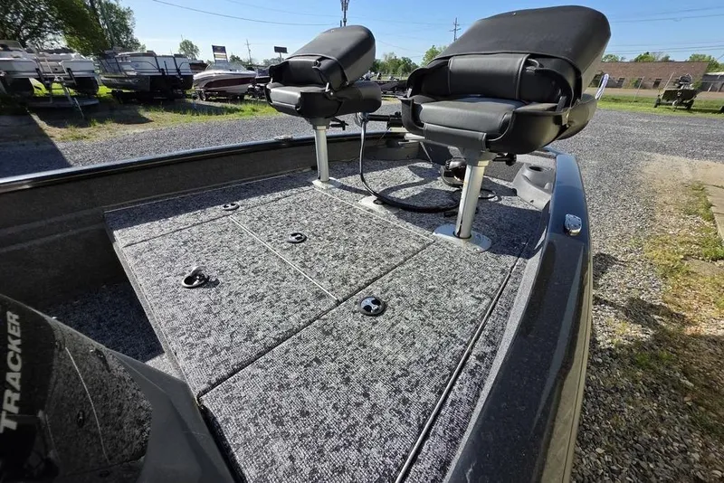 Slide: The Image of Trailer hitch of 2025 Tracker Pro Team 175 Crappie Edition on gravel surface. - 12