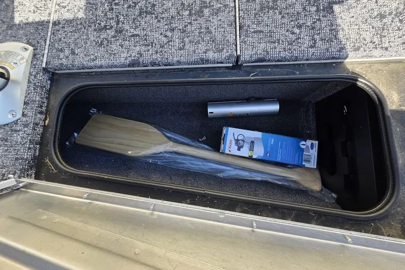 Slide: The Image of Top view of 2025 Tracker Pro Team 175 Crappie Edition boat interior layout. - 16