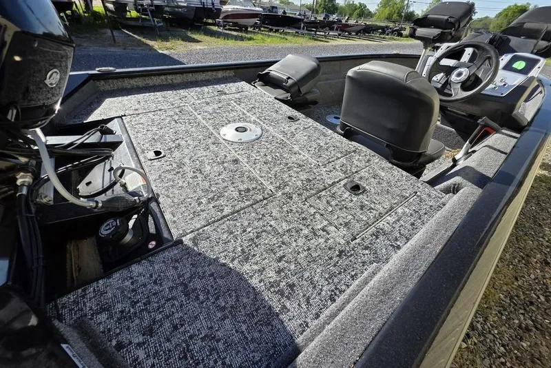 Slide: The Image of 2025 Tracker Pro Team 175 Crappie Edition boat with dual seats and Minn Kota trolling motor. - 9