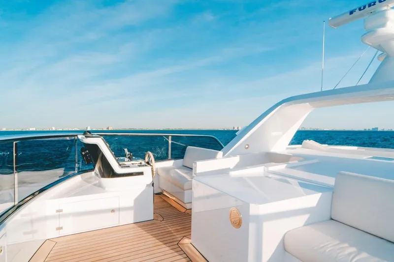 Slide: The Image of Luxurious 2020 Benetti Delfino yacht deck with ocean view and modern seating. - 12