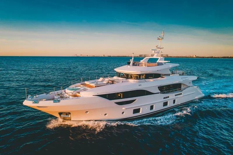 Slide: The Image of Luxury Benetti Delfino Co Ownership yacht cruising at sunset, 2020 model. - 6