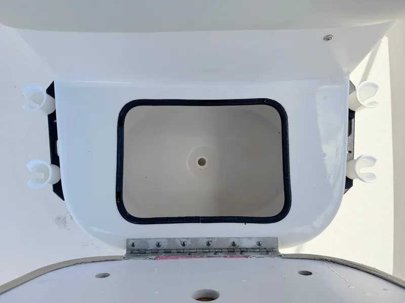 Slide: The Image of Open storage compartment on 2016 Key West 1720 Center Console boat. - 12