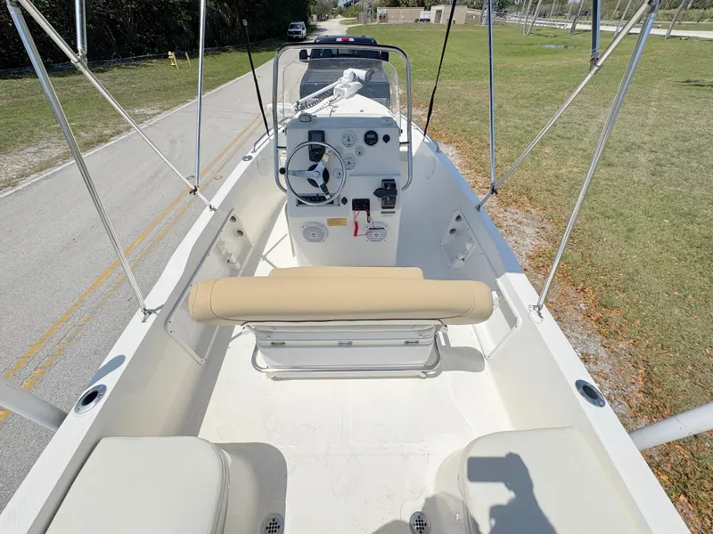 Slide: The Image of 2016 Key West 1720 Center Console boat interior with steering wheel and seating. - 24
