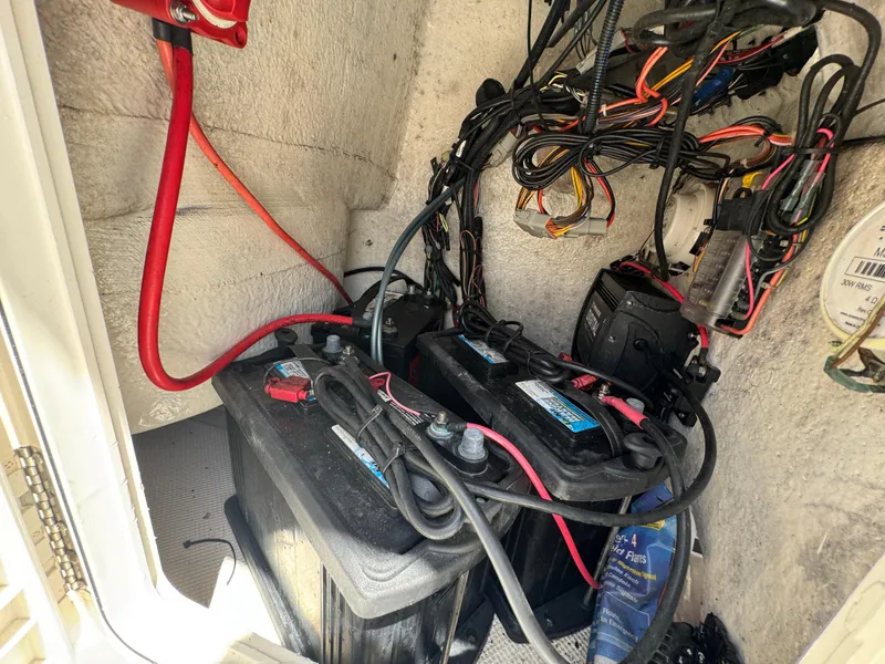 Slide: The Image of Battery compartment of a 2016 Key West 1720 Center Console boat with wiring. - 25