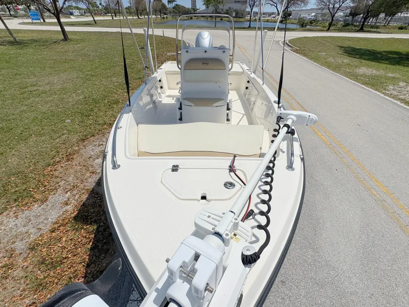 Slide: The Image of 2016 Key West 1720 Center Console boat on a road, ready for launch. - 7