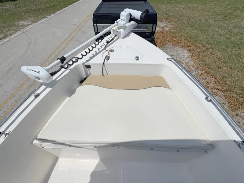 Slide: The Image of 2016 Key West 1720 Center Console boat with trolling motor on trailer. - 8