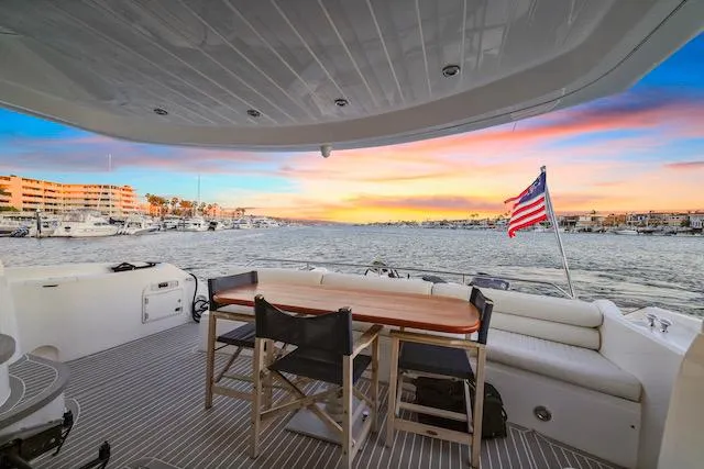 Slide: The Image of Luxurious Sunseeker Manhattan 60 yacht deck with sunset view, 2008 model. - 10