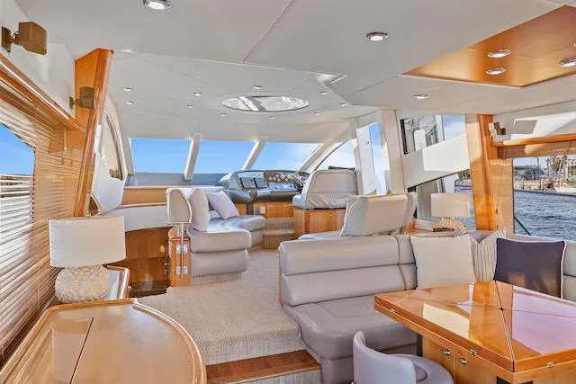Slide: The Image of Luxurious interior of 2008 Sunseeker Manhattan 60 yacht with elegant seating and panoramic windows. - 14