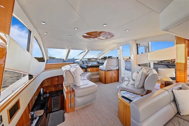 Slide: The Image of Luxurious interior of 2008 Sunseeker Manhattan 60 yacht with elegant seating and panoramic windows. - 15