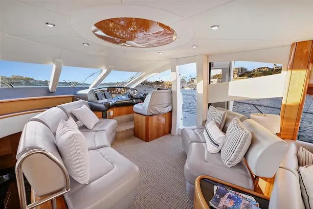 Slide: The Image of Luxurious interior of 2008 Sunseeker Manhattan 60 yacht with plush seating and panoramic windows. - 16