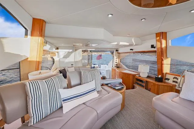 Slide: The Image of Luxurious interior of 2008 Sunseeker Manhattan 60 yacht with elegant seating and panoramic windows. - 19