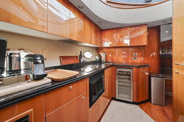 Slide: The Image of Luxurious kitchen interior of 2008 Sunseeker Manhattan 60 yacht with modern appliances. - 23