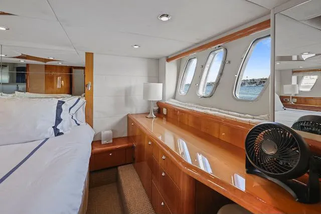 Slide: The Image of Luxurious cabin interior of 2008 Sunseeker Manhattan 60 yacht with elegant wood finish. - 28