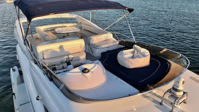 Slide: The Image of Luxurious 2008 Sunseeker Manhattan 60 yacht with spacious deck and seating area. - 4