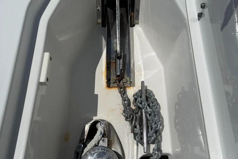 Slide: The Image of Anchor chain compartment of 2016 Sea Hunt Gamefish 27 boat. - 38