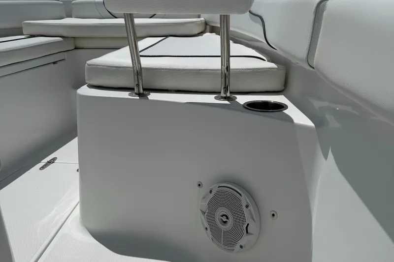 Slide: The Image of 2016 Sea Hunt Gamefish 27 boat interior with seating and speaker detail. - 47