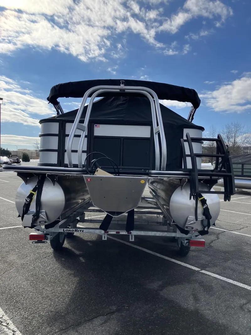 Slide: The Image of 2025 Bentley Pontoons 223 Fish-N-Cruise pontoon boat in parking lot, rear view. - 3