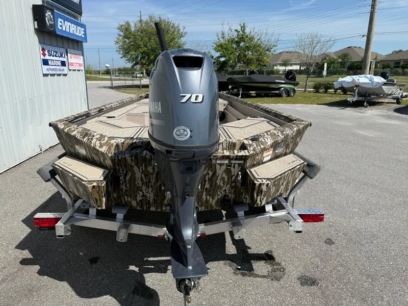 Slide: The Image of 2025 Avid 18 Commander boat with Yamaha 70 engine on trailer. - 11