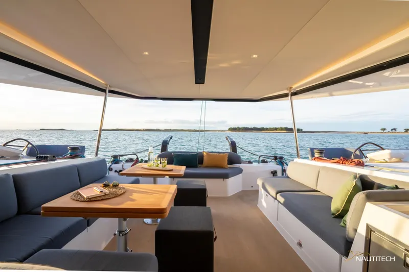 Slide: The Image of Luxurious interior of 2025 Nautitech 48 Open yacht with ocean view. - 30