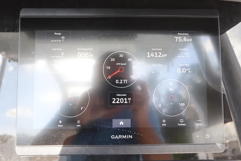 Slide: The Image of Garmin display on 2023 Blackfin 272 CC boat showing speed, fuel, and odometer readings. - 24