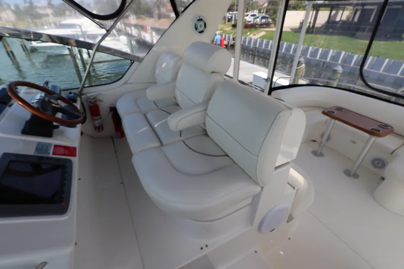 Slide: The Image of Luxurious interior of 2000 Cruisers Yachts 4450 Express Motoryacht with plush white seating. - 20