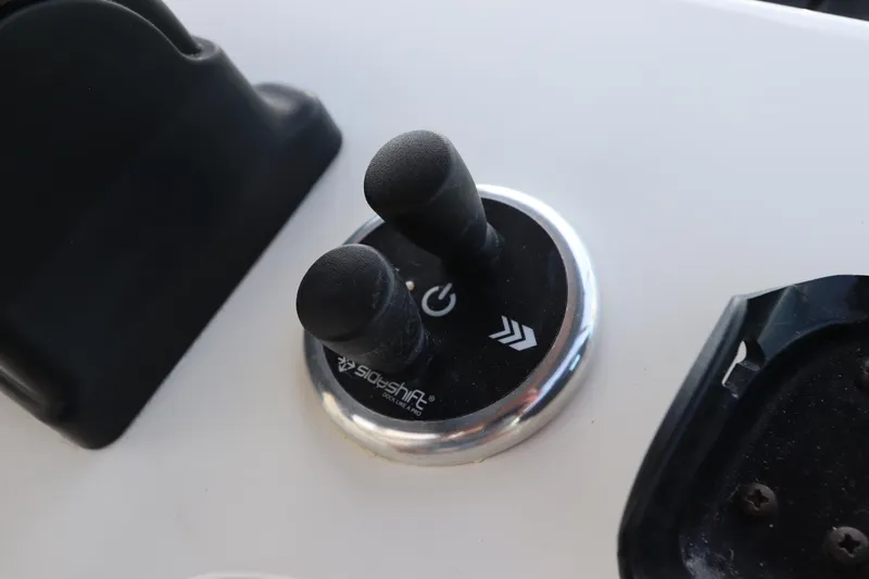 Slide: The Image of Control panel of 2000 Cruisers Yachts 4450 Express Motoryacht with dual joysticks. - 24