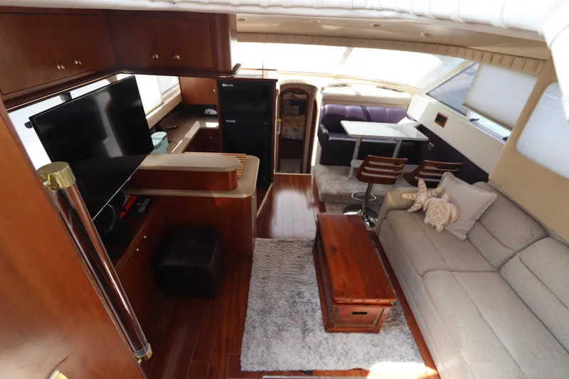 Slide: The Image of Luxurious interior of 2000 Cruisers Yachts 4450 Express Motoryacht with modern amenities and elegant design. - 26