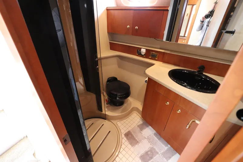 Slide: The Image of Luxurious bathroom in 2000 Cruisers Yachts 4450 Express Motoryacht with modern fixtures. - 38