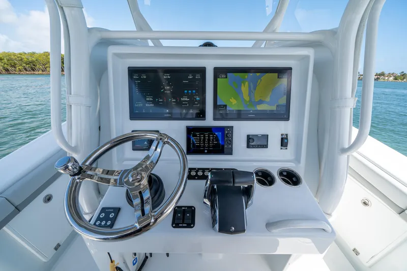 Slide: The Image of 2023 Yellowfin 36 Center Console helm with advanced navigation displays and controls. - 3
