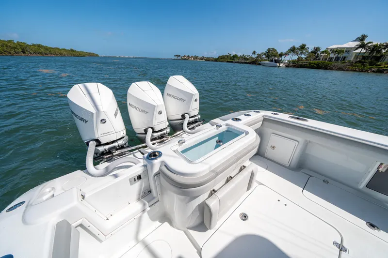Slide: The Image of 2023 Yellowfin 36 Center Console boat with triple Mercury engines on a sunny day. - 4