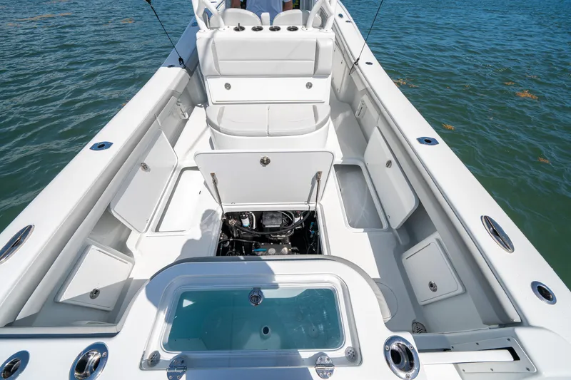 Slide: The Image of 2023 Yellowfin 36 Center Console boat interior with open storage compartments. - 9