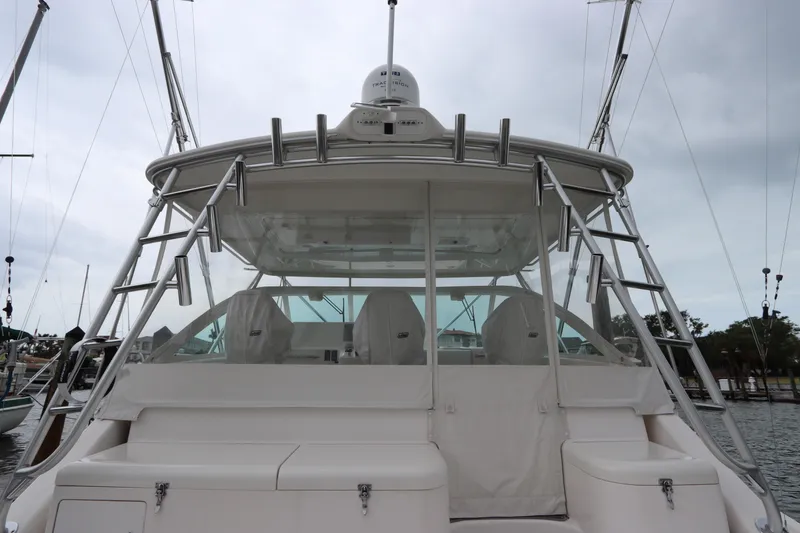 Slide: The Image of 2007 Cabo 40 Hardtop Express yacht with sleek design and spacious seating area. - 17