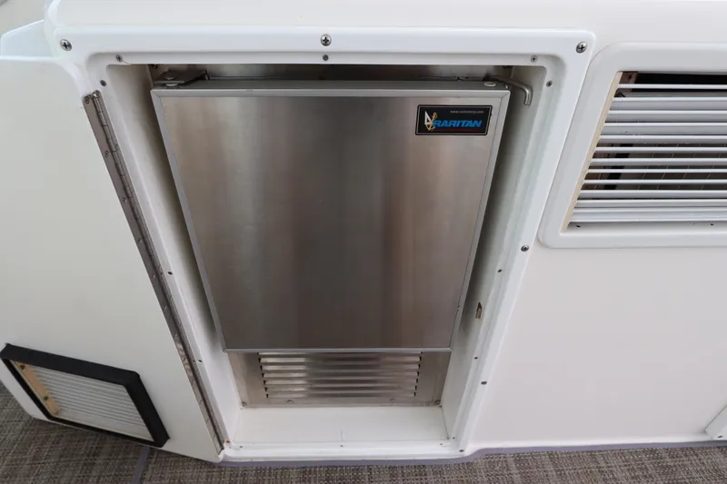 Slide: The Image of Stainless steel refrigerator on 2007 Cabo 40 Hardtop Express boat. - 25