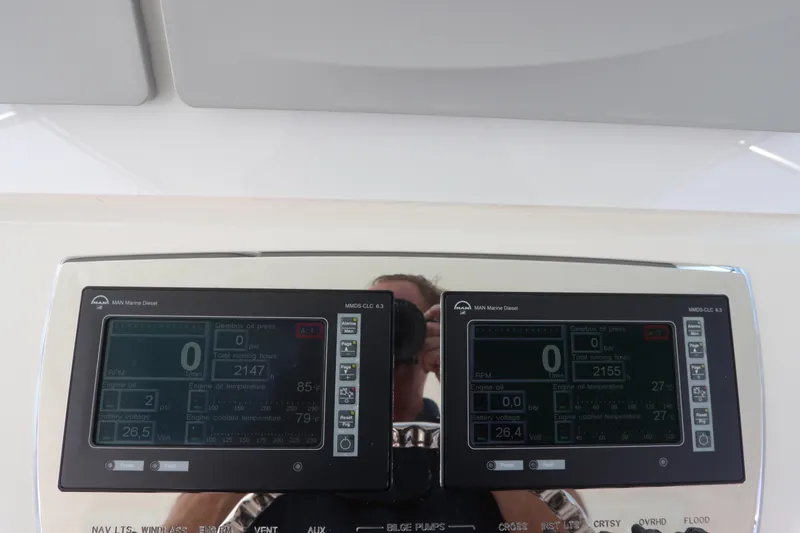 Slide: The Image of Dashboard of a 2007 Cabo 40 Hardtop Express with dual electronic displays. - 33