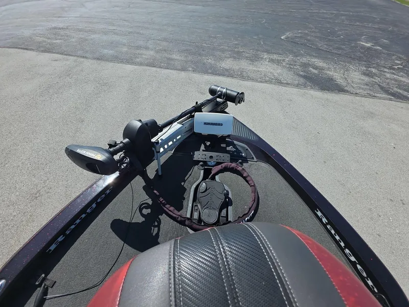 Slide: The Image of 2011 Ranger Z521 Comanche boat with advanced navigation equipment on deck. - 11