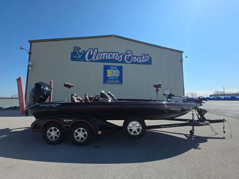 Slide: The Image of 2011 Ranger Z521 Comanche boat parked at Clemons Boats dealership. - 5