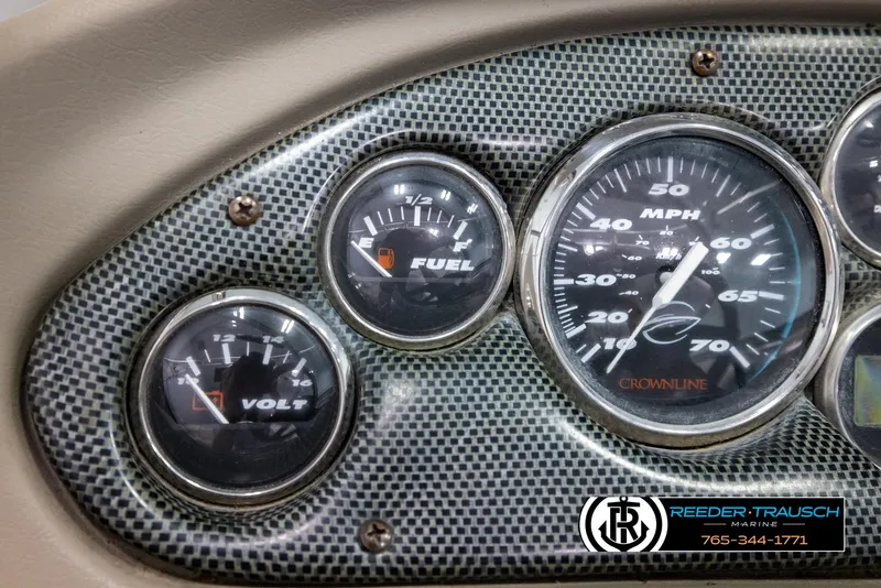 Slide: The Image of Dashboard of 2005 Crownline 216 LS boat with speedometer, fuel, and volt gauges. - 27