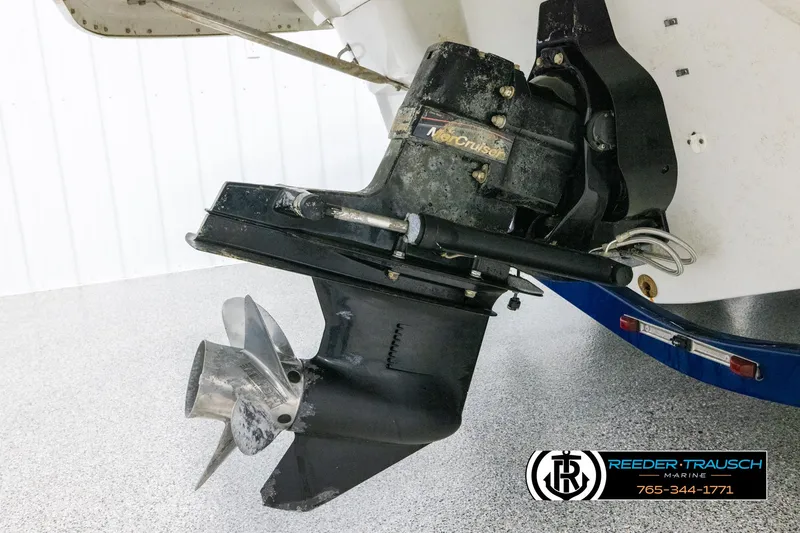 Slide: The Image of 2005 Crownline 216 LS boat motor and propeller detail in a showroom. - 42