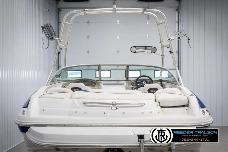 Slide: The Image of 2005 Crownline 216 LS boat in a storage facility, rear view. - 6