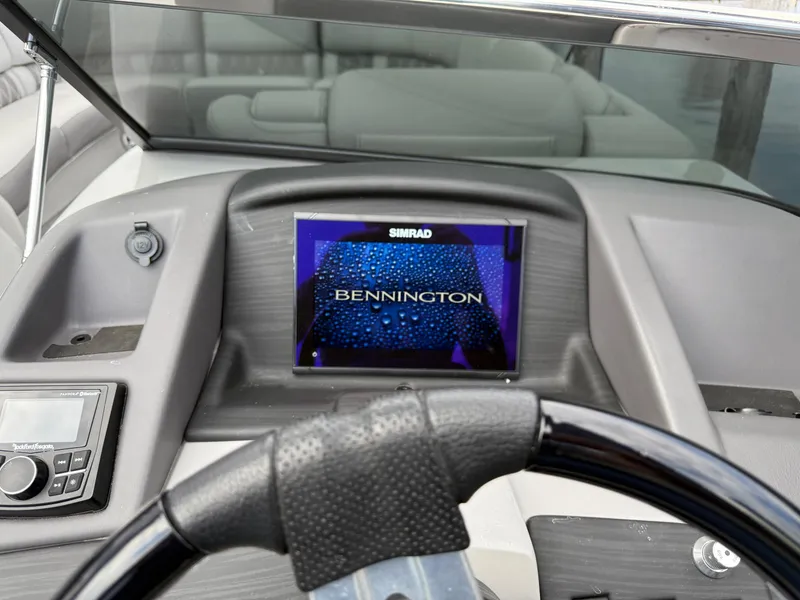 Slide: The Image of Dashboard of 2020 Bennington R 25 RFBWA Fastback with Simrad display. - 14