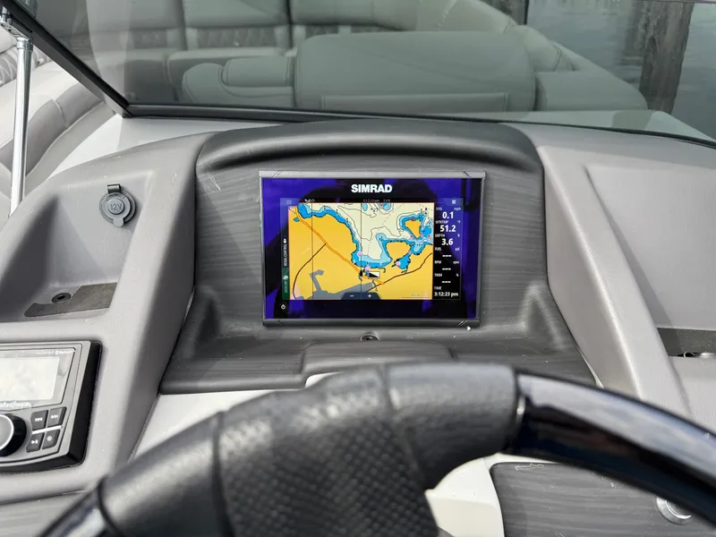 Slide: The Image of Dashboard of 2020 Bennington R 25 RFBWA Fastback with Simrad navigation display. - 15