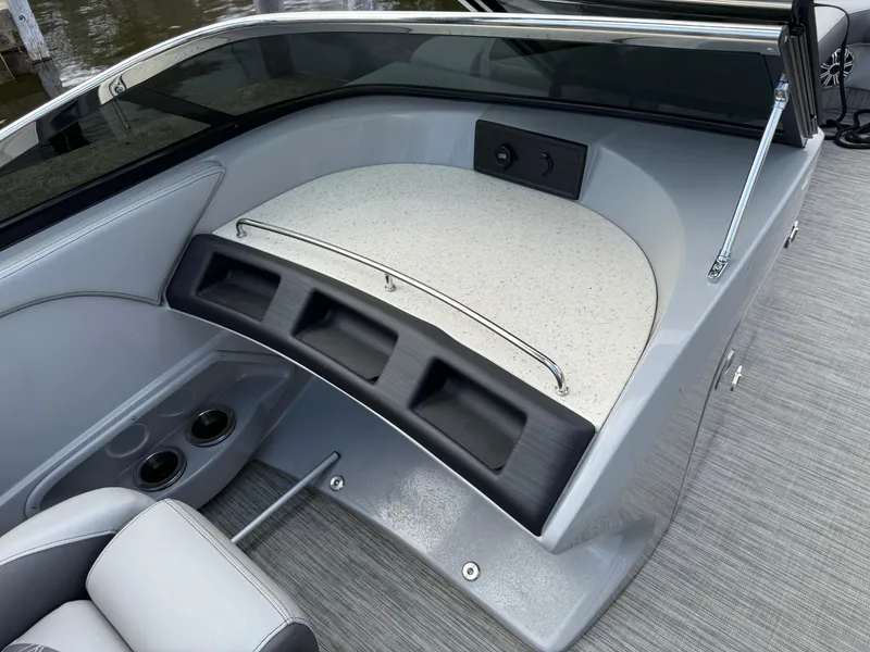Slide: The Image of 2020 Bennington R 25 RFBWA Fastback boat interior with seating and cup holders. - 16
