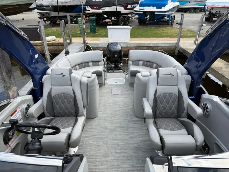 Slide: The Image of 2020 Bennington R 25 RFBWA Fastback pontoon boat with luxurious seating and modern design. - 22