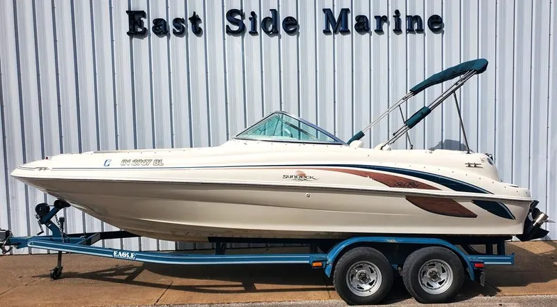 Slide: The Image of 1998 Sea Ray 210 Sundeck boat on trailer at East Side Marine. - 0