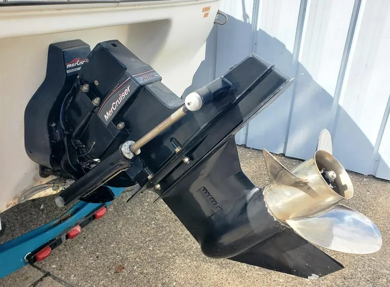 Slide: The Image of 1998 Sea Ray 210 Sundeck with MerCruiser outboard motor and propeller. - 15