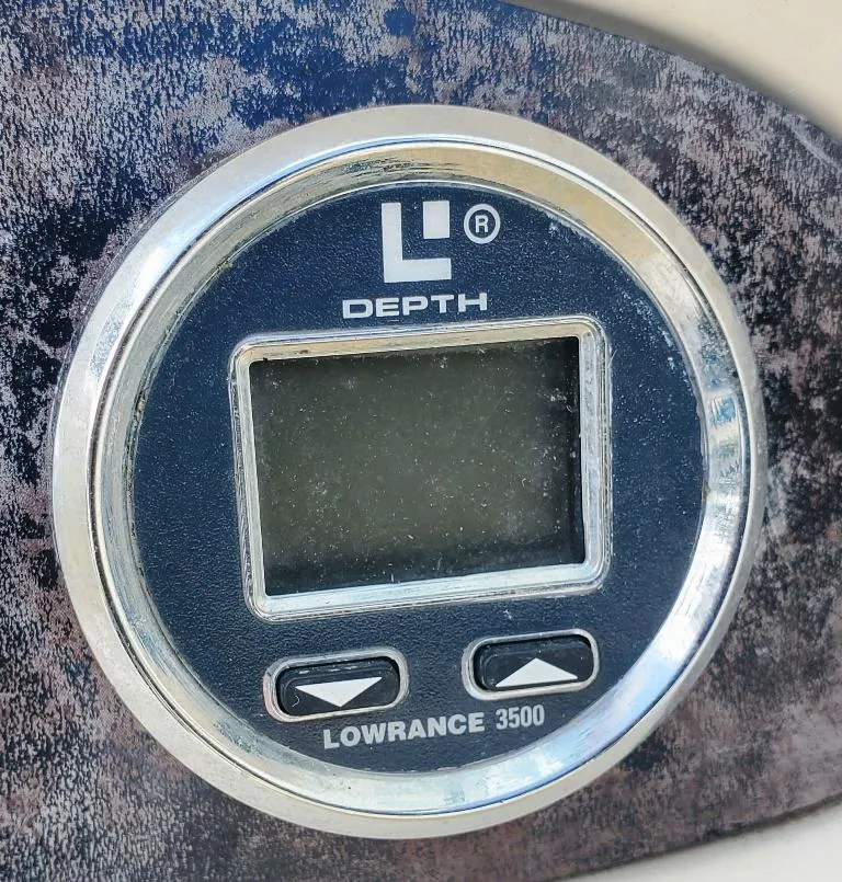Slide: The Image of Lowrance 3500 depth gauge on 1998 Sea Ray 210 Sundeck dashboard. - 21