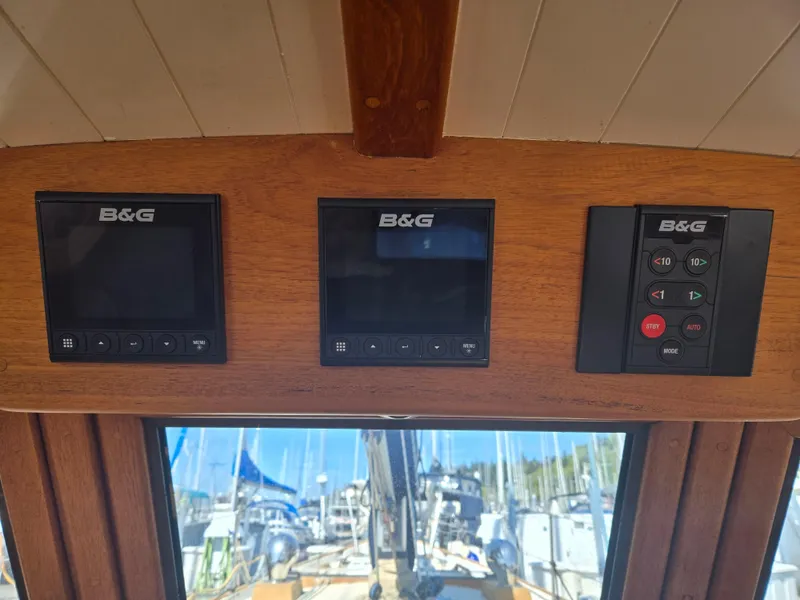 Slide: The Image of B&G navigation instruments on a 1980 Shannon 38 PH sailboat dashboard. - 14