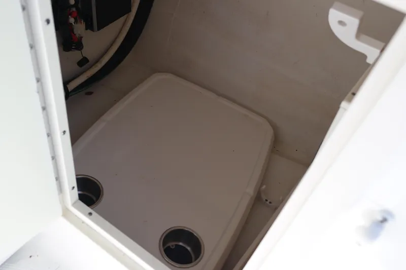 Slide: The Image of Storage compartment in a 2015 Chaparral 250 Suncoast boat. - 5