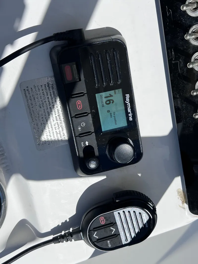 Slide: The Image of Raymarine marine radio on 2016 Sportsman Masters 227 Bay Boat dashboard. - 14